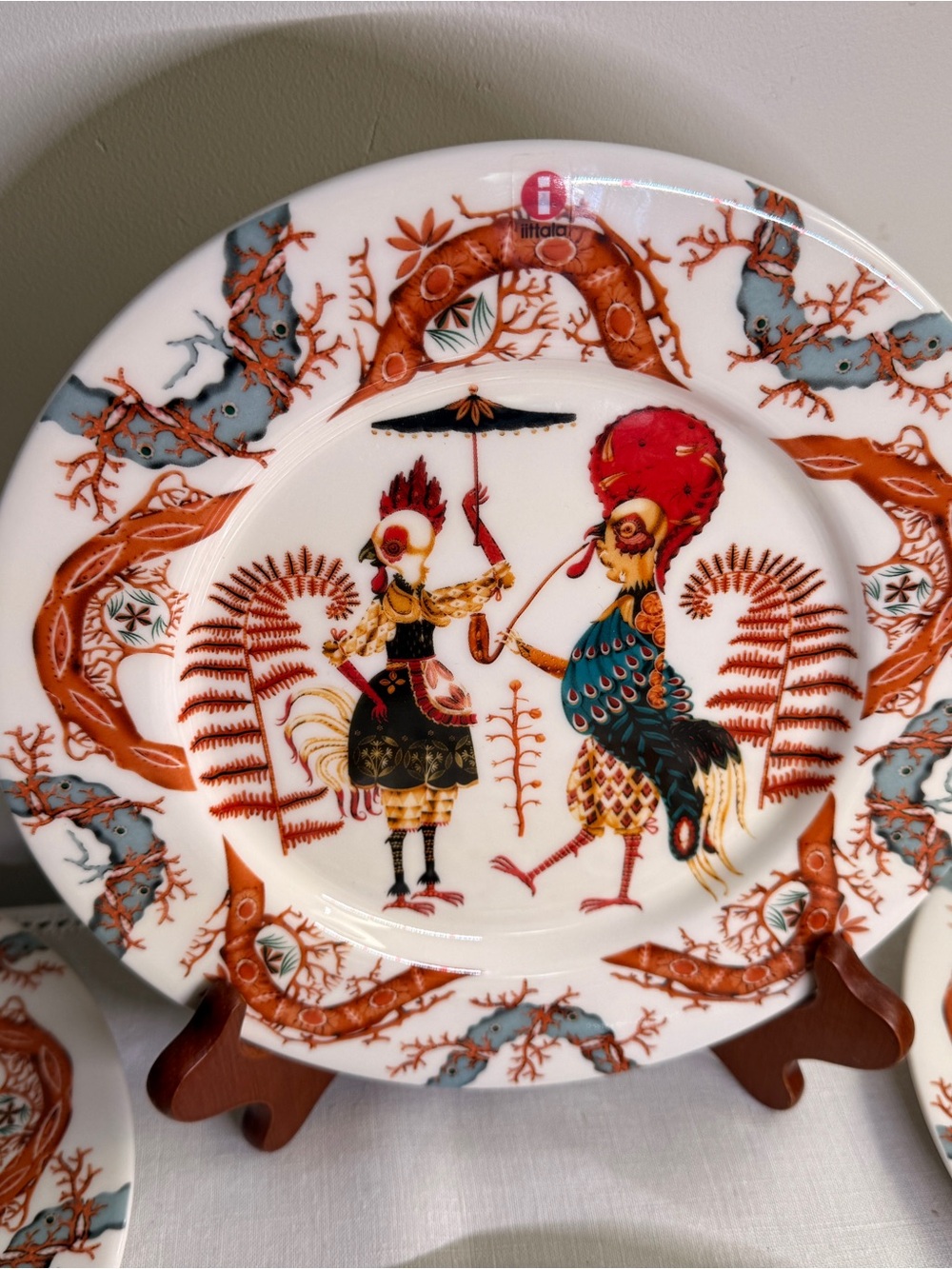 Iittala Decorative Plate with Red, Blue, and Orange Rooster Couple
